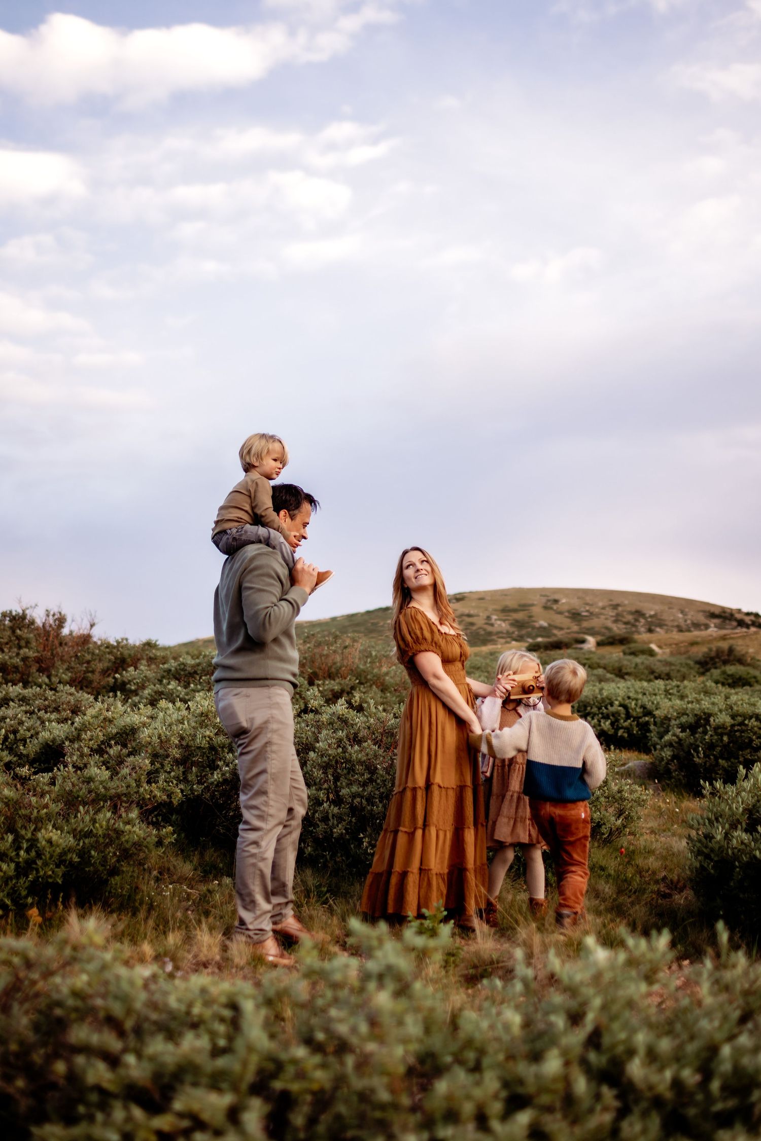 young family playing,  lifestyle portrait photographer inNavarre Florida