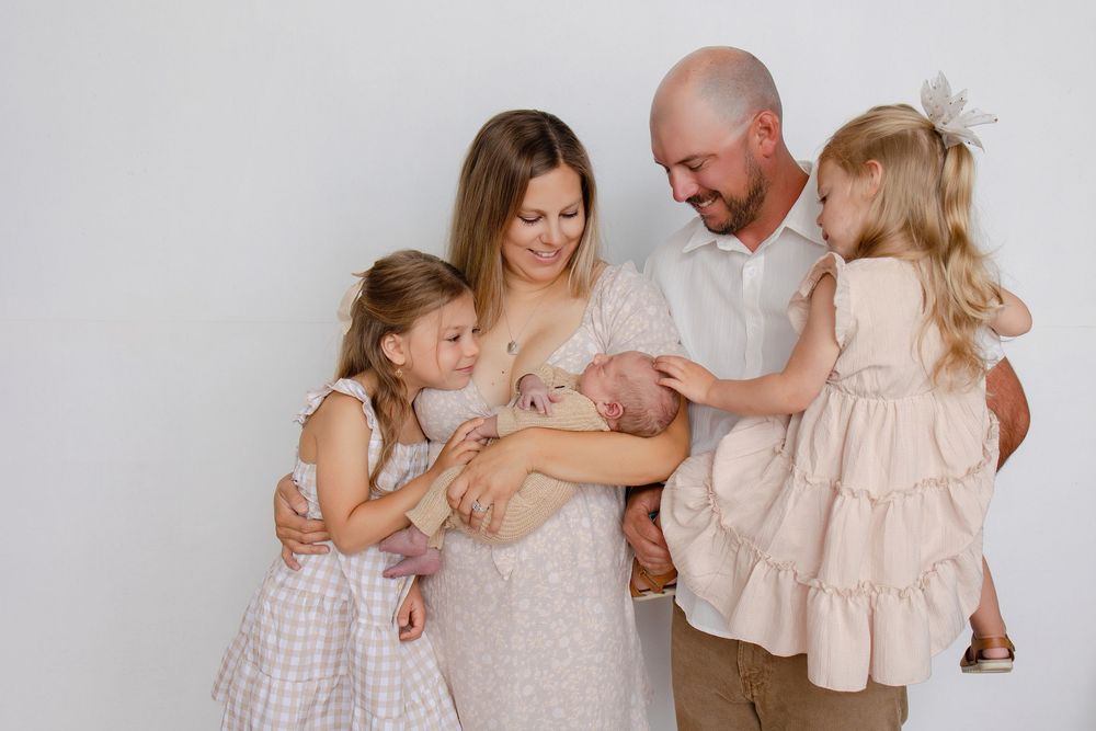 Kendall Kuss Photography Waukesha County family photographer. Newborn photos in Watertown WI natural light studio