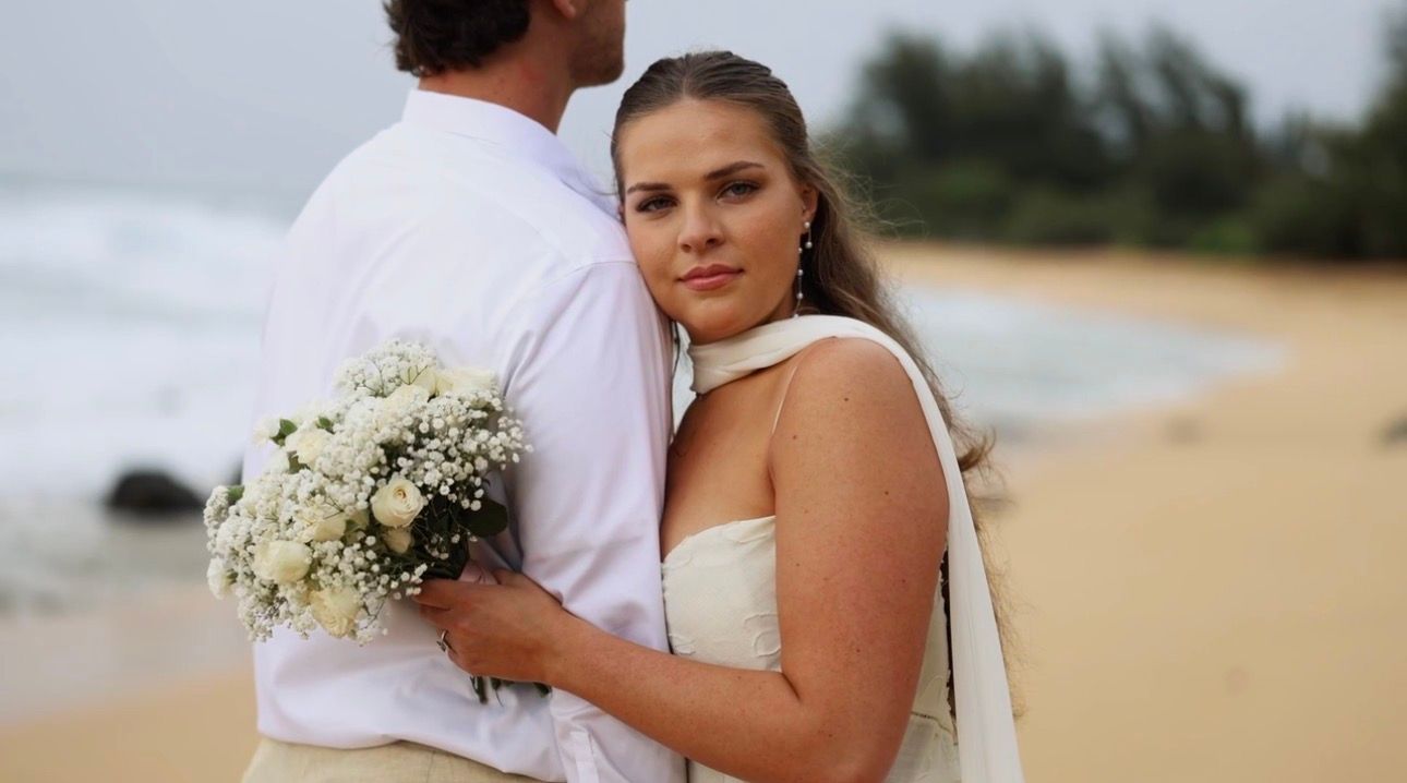 Romantic wedding photography at Tunnels Beach featuring Kauai’s iconic coastline.