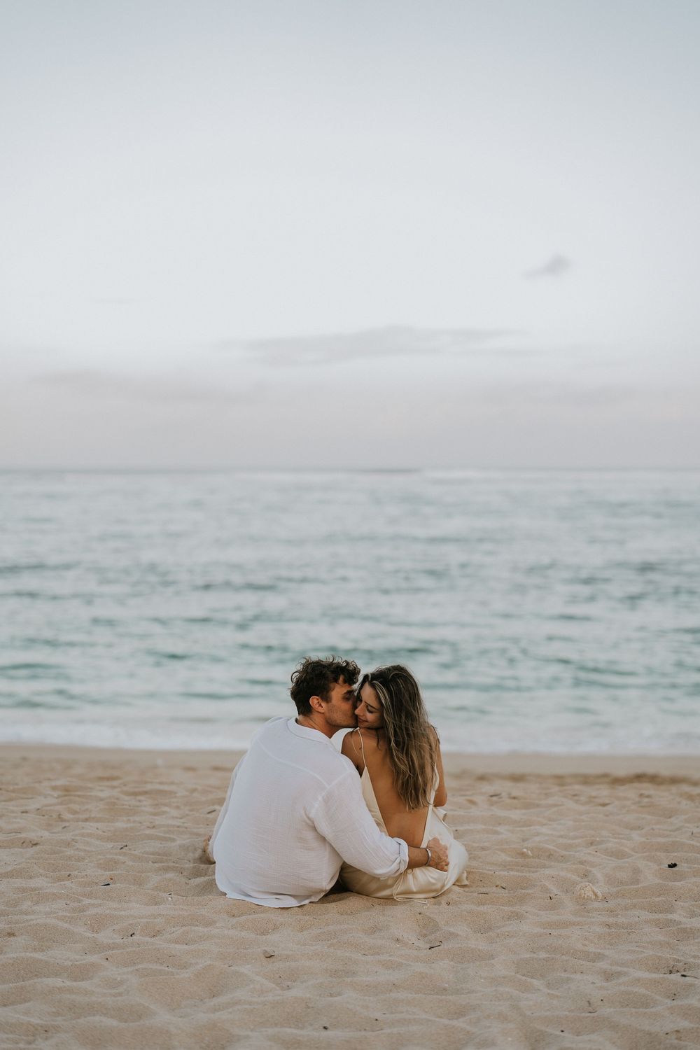 Professional proposal photographer capturing engagement moment in Nusa Dua