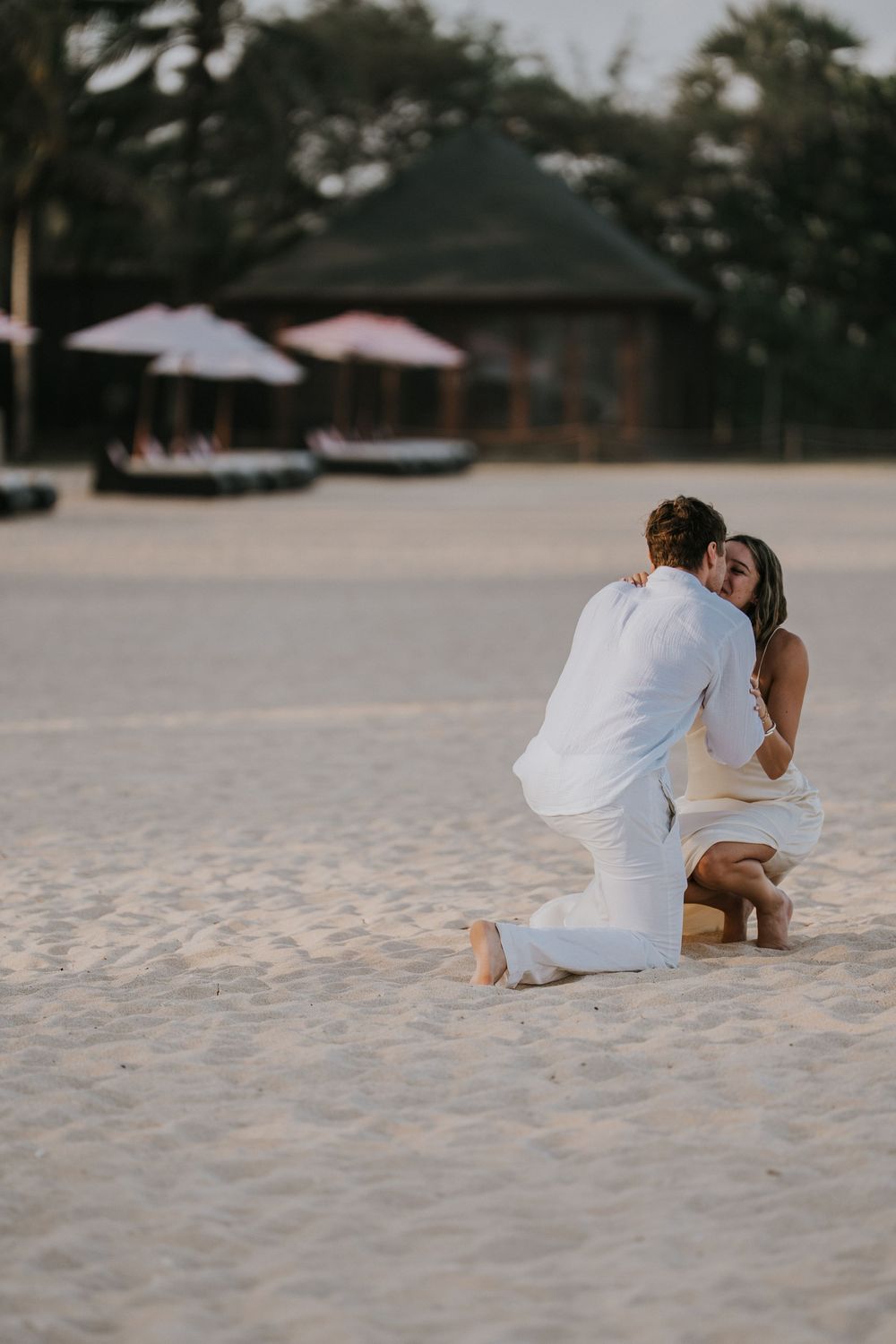 Professional proposal photographer capturing engagement moment in Nusa Dua