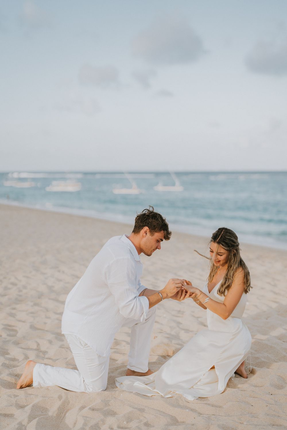 Professional proposal photographer capturing engagement moment in Nusa Dua