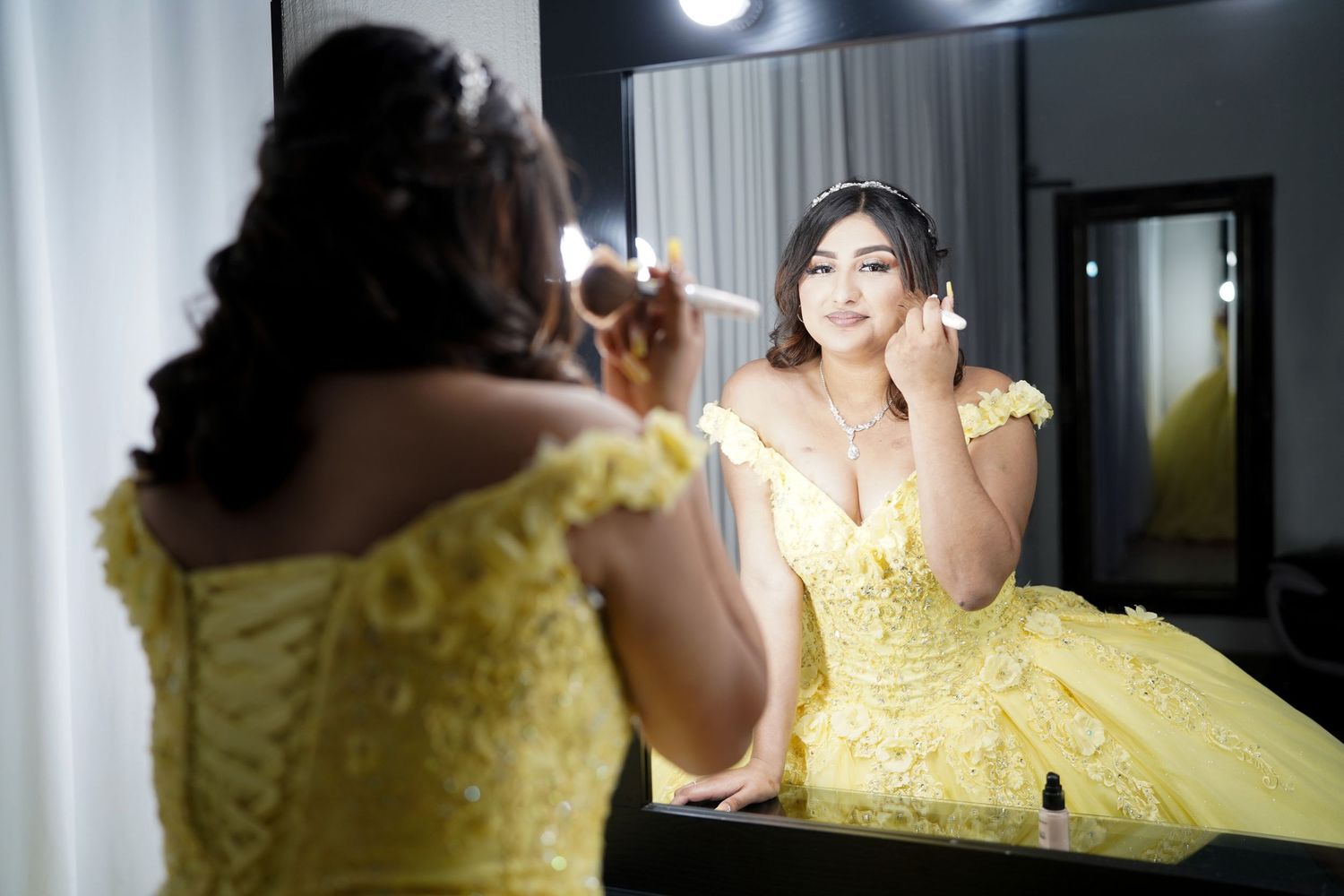 Timeless Quinceañera portrait of Briana photographed at Las Colinas Canals by experienced Dallas Fort Worth Quince photographers.