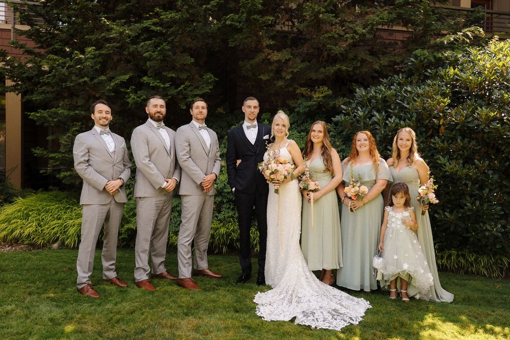 Wedding party portraits with sage green dresses at Willows Lodge in Woodinville.