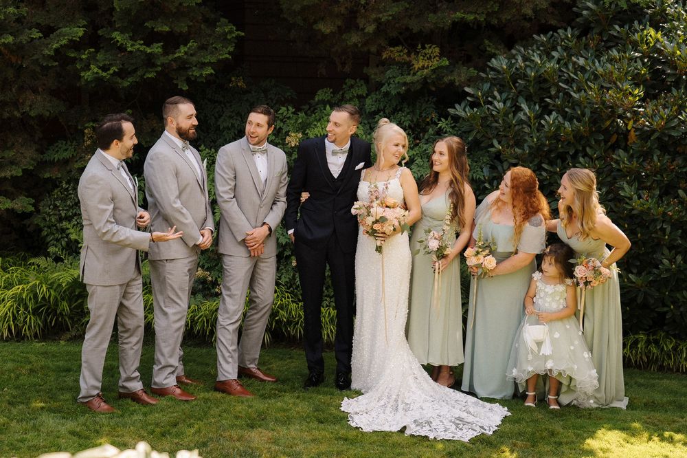 Wedding party portraits with sage green dresses at Willows Lodge in Woodinville.