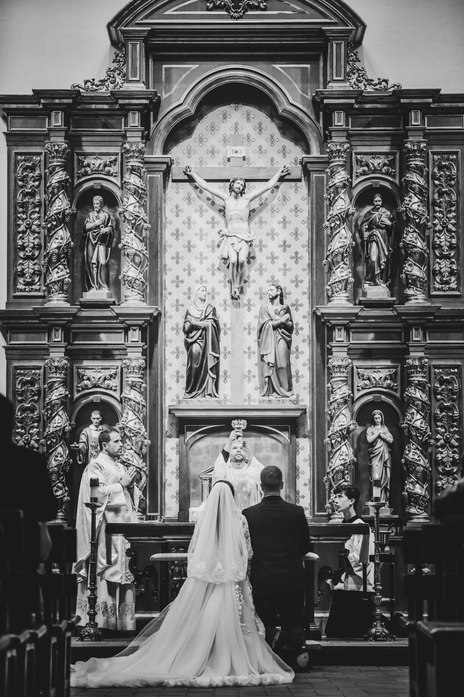 Bride walking down aisle during St Ann Catholic Parish wedding