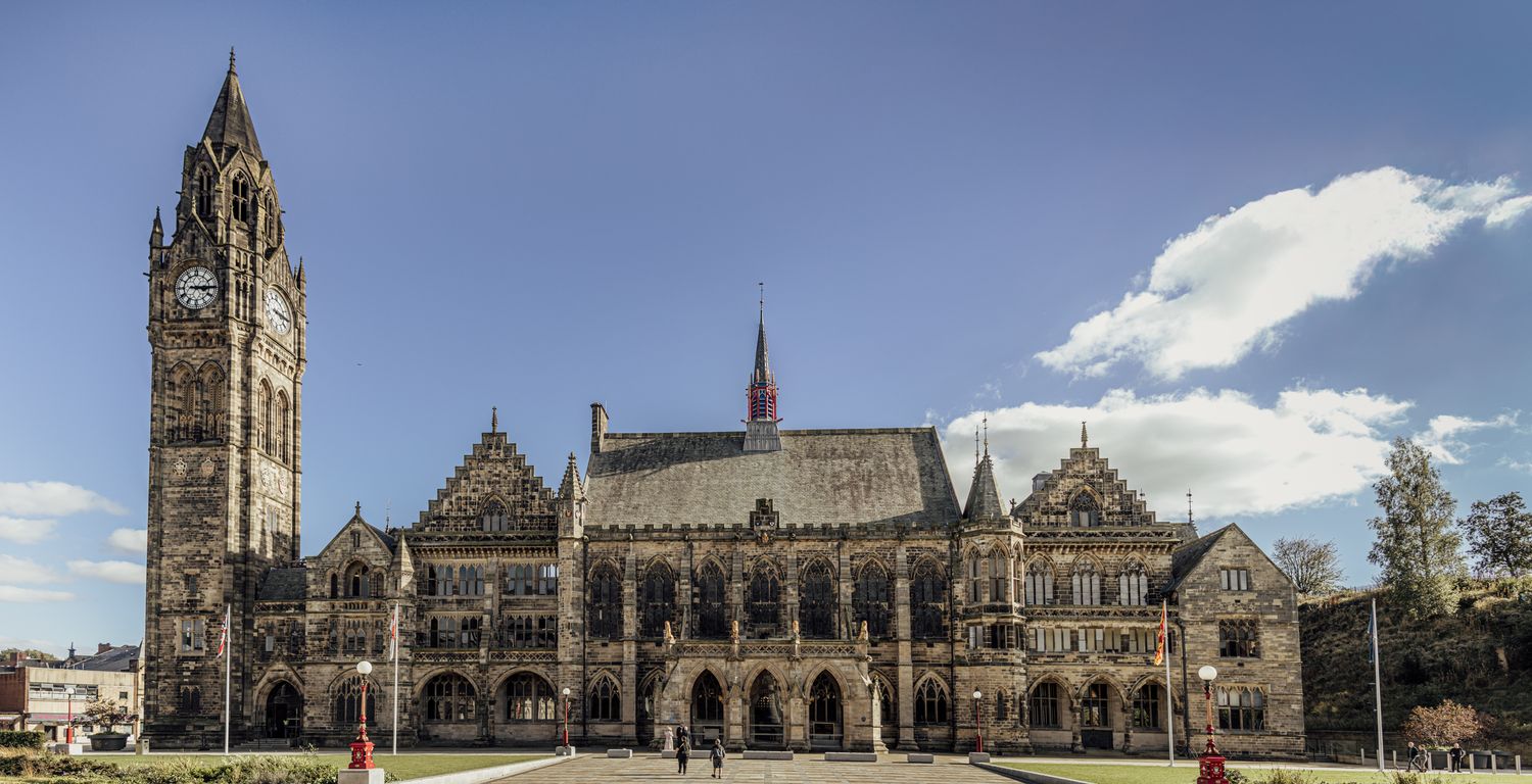 Panoramic view of the magnificent Gothic architecture and ornate interior of Rochdale Town Hall, a historic Greater Manchester wedding venue