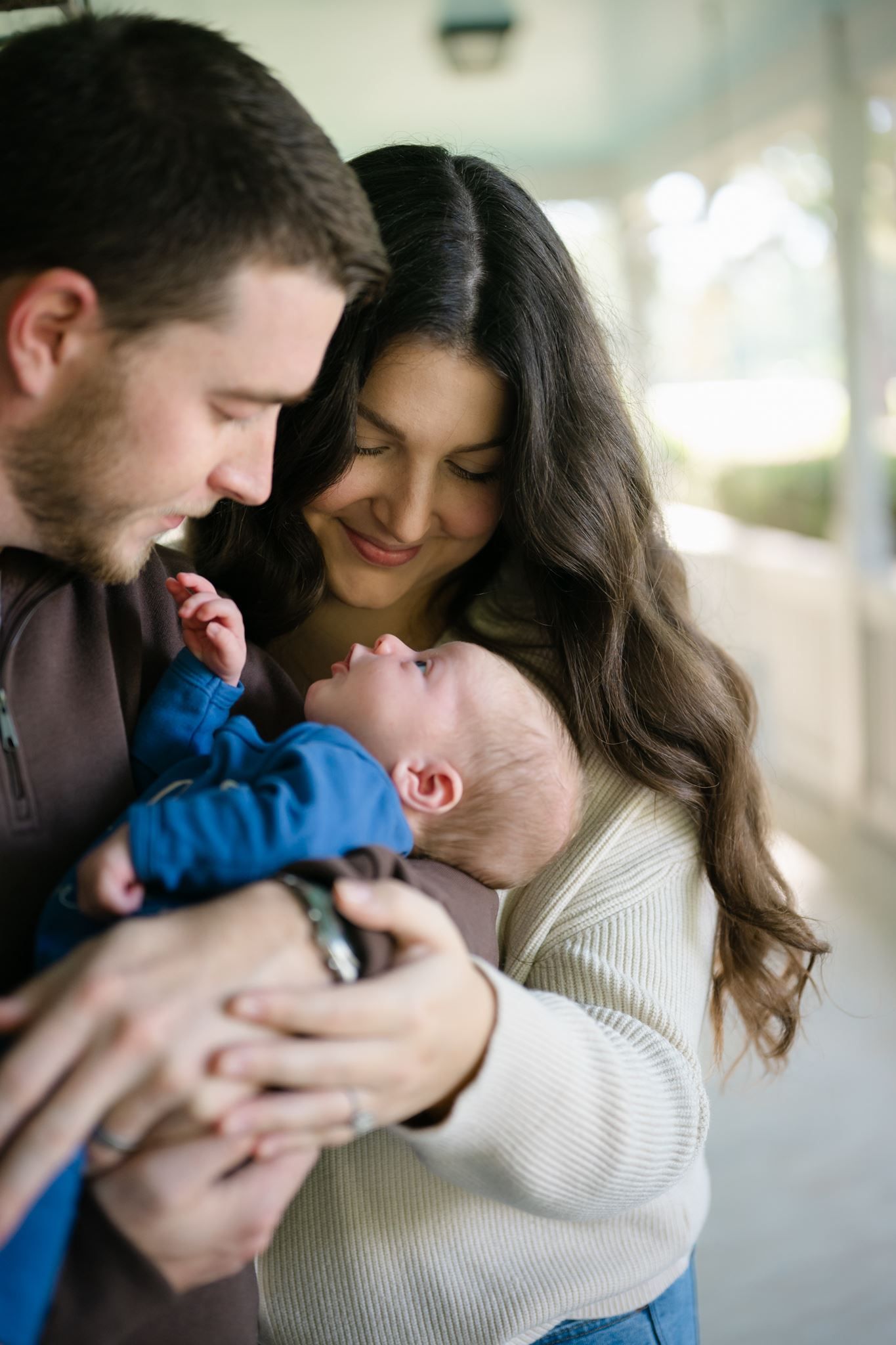Three-week-old newborn baby boy photographed during a relaxed lifestyle session.