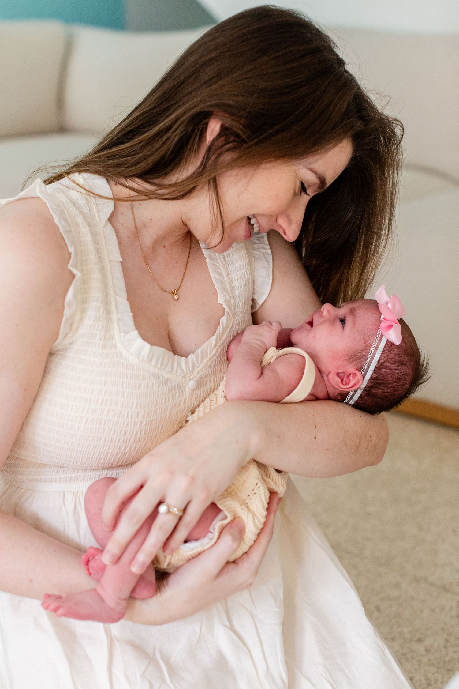 Portrait of a mother and newborn. In-home lifestyle newborn session in Guaynabo, Puerto Rico.