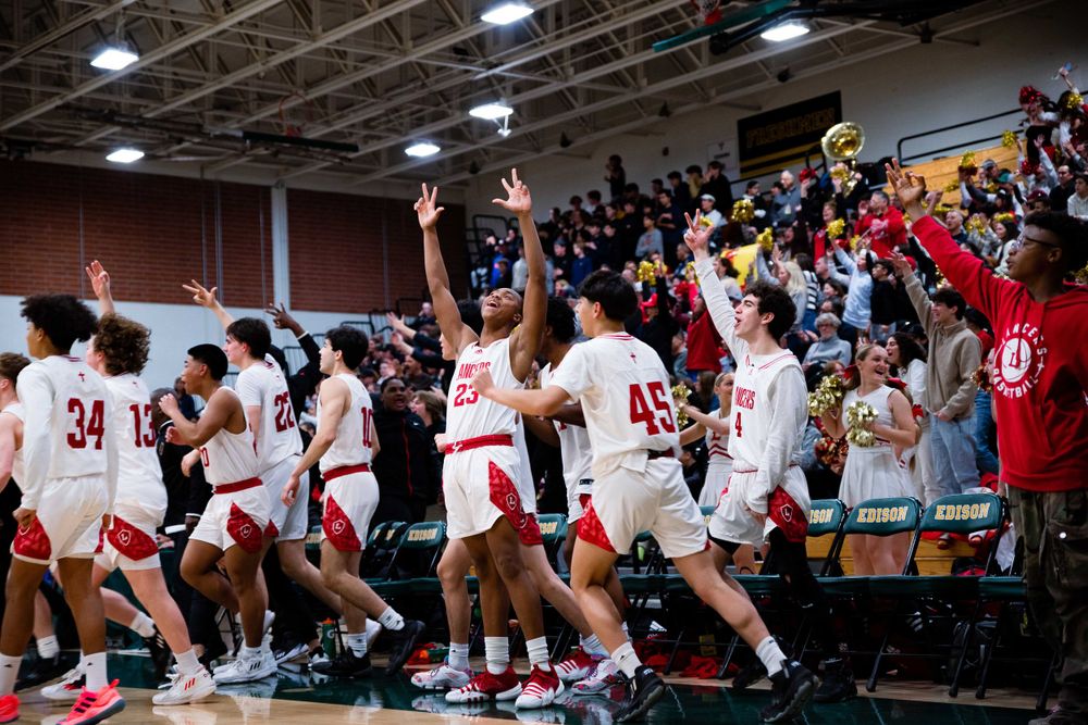 OLu boys basketball players compete during a game in the gym, captured by Chris Cornish Photography.