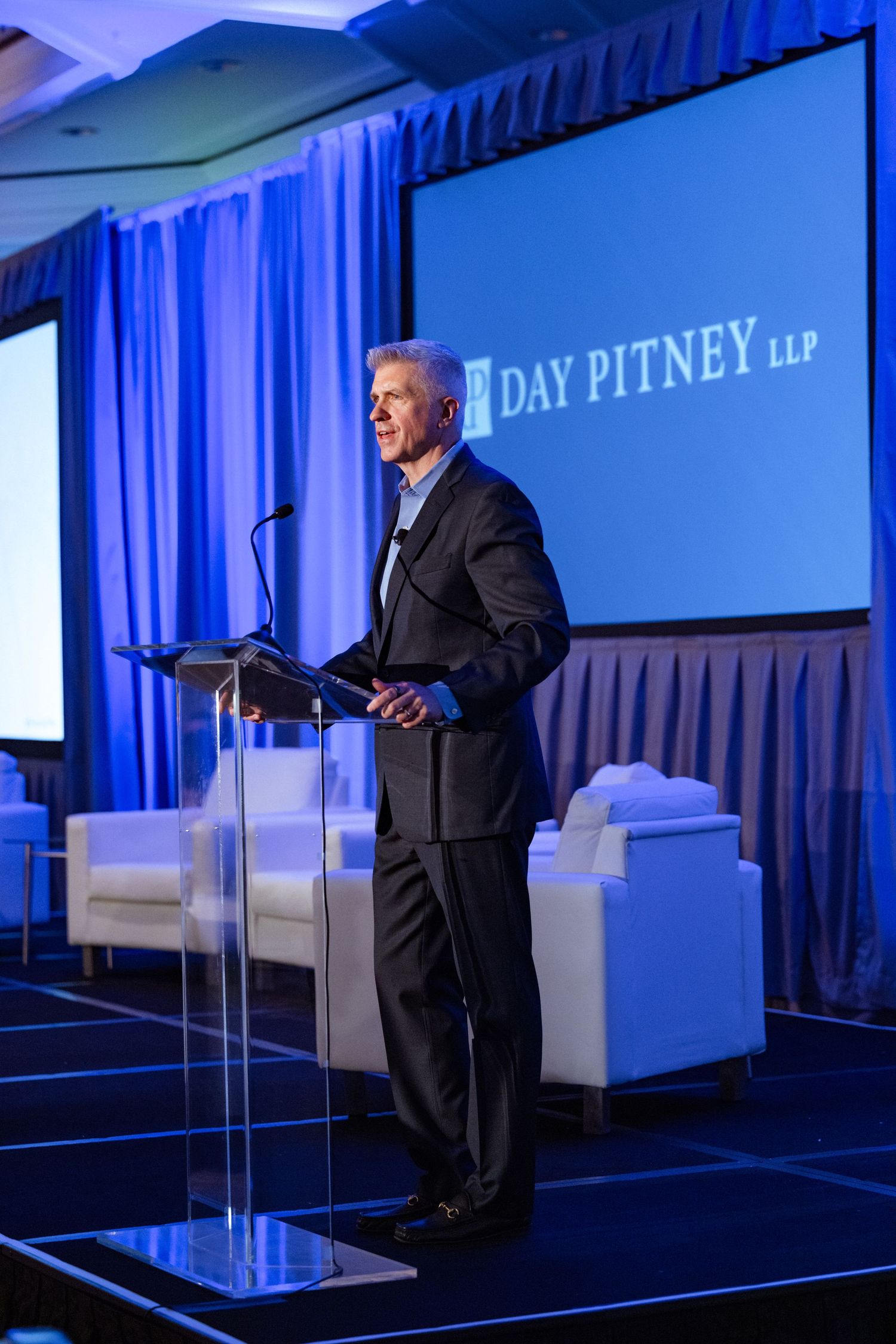 Executive panel discussion captured during a South Florida corporate event, highlighting professional conference and event photography.