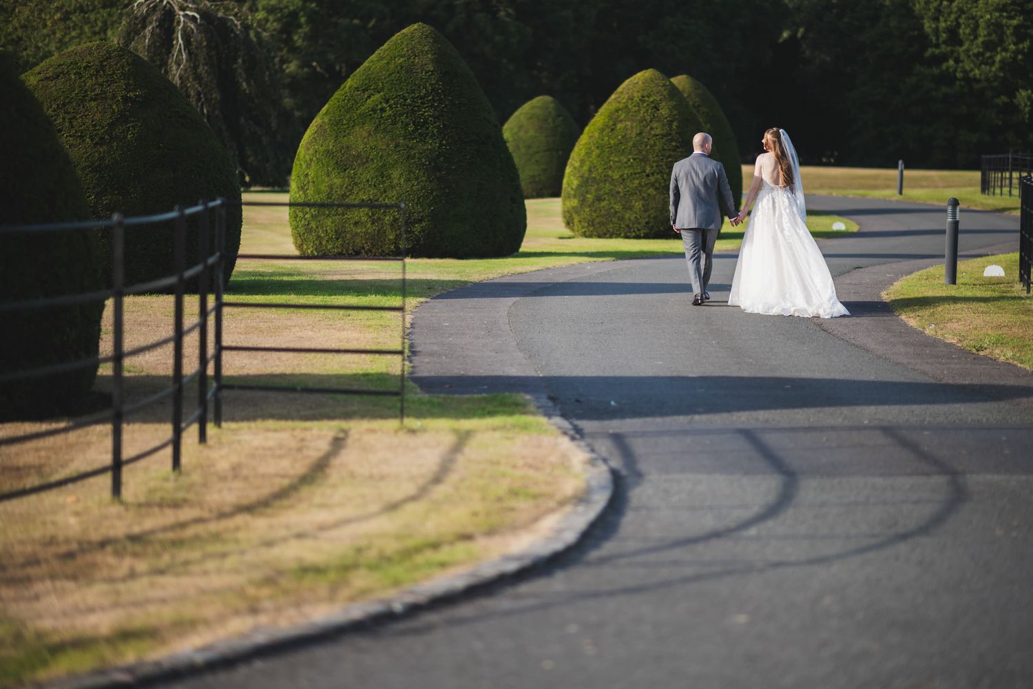 Charlotte and Niall on the driveway through the parkland at Merrydale Manor