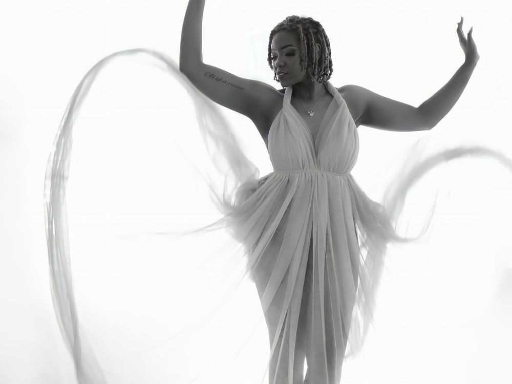 Fine art luxury boudoir portrait of a woman showcasing the Shira W Rose signature studio wardrobe in Raleigh, NC.