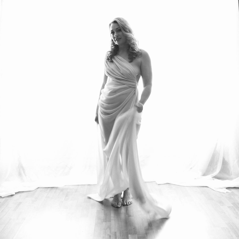 Luxury boudoir photography featuring elegant textures and thoughtful posing for women in North Carolina.