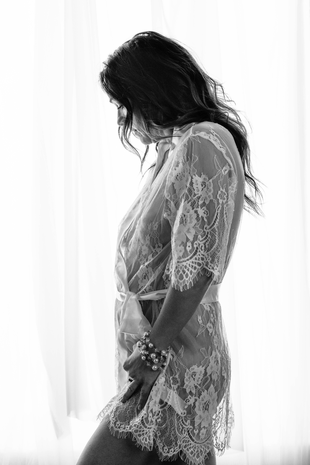 Empowering feminine portraiture and luxury boudoir artwork by Shira W Rose in Raleigh.