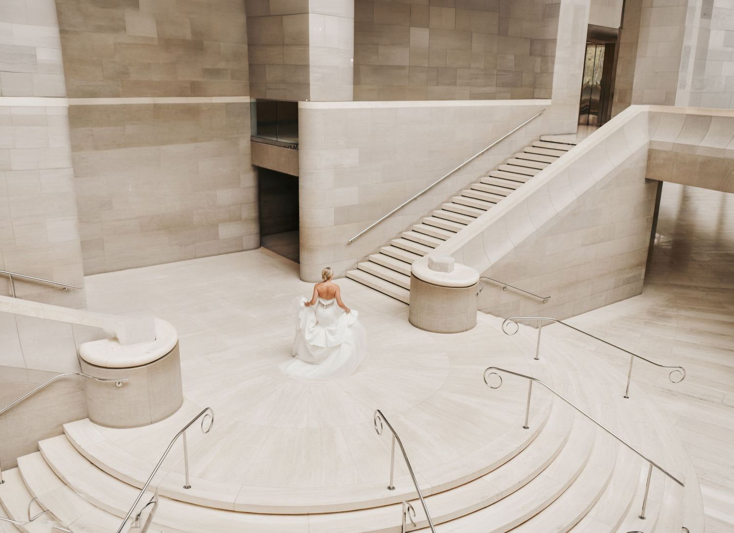 High-end Dallas bridal portrait with dramatic architecture and timeless wedding style