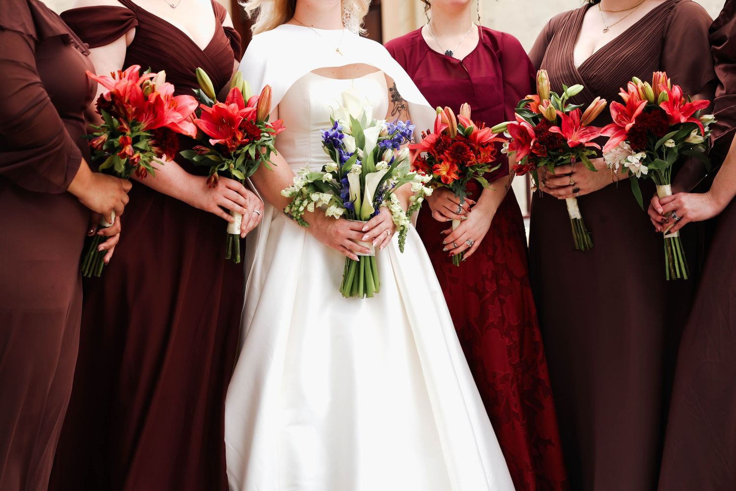 bride maids holding flowers