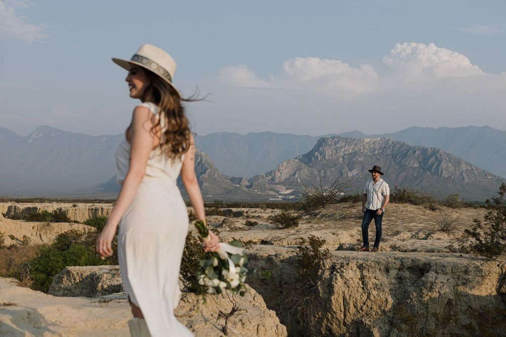 Desert mountain landscape provides dramatic backdrop for wedding photography.