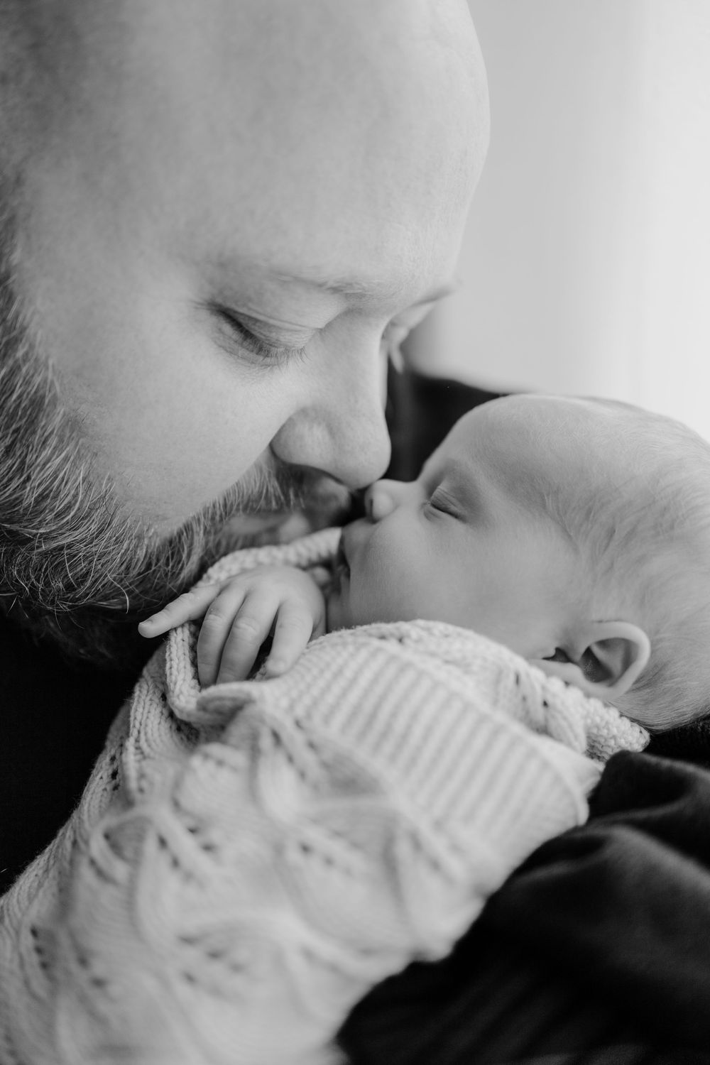 Adelaide newborn photographer - father holding newborn baby boy
