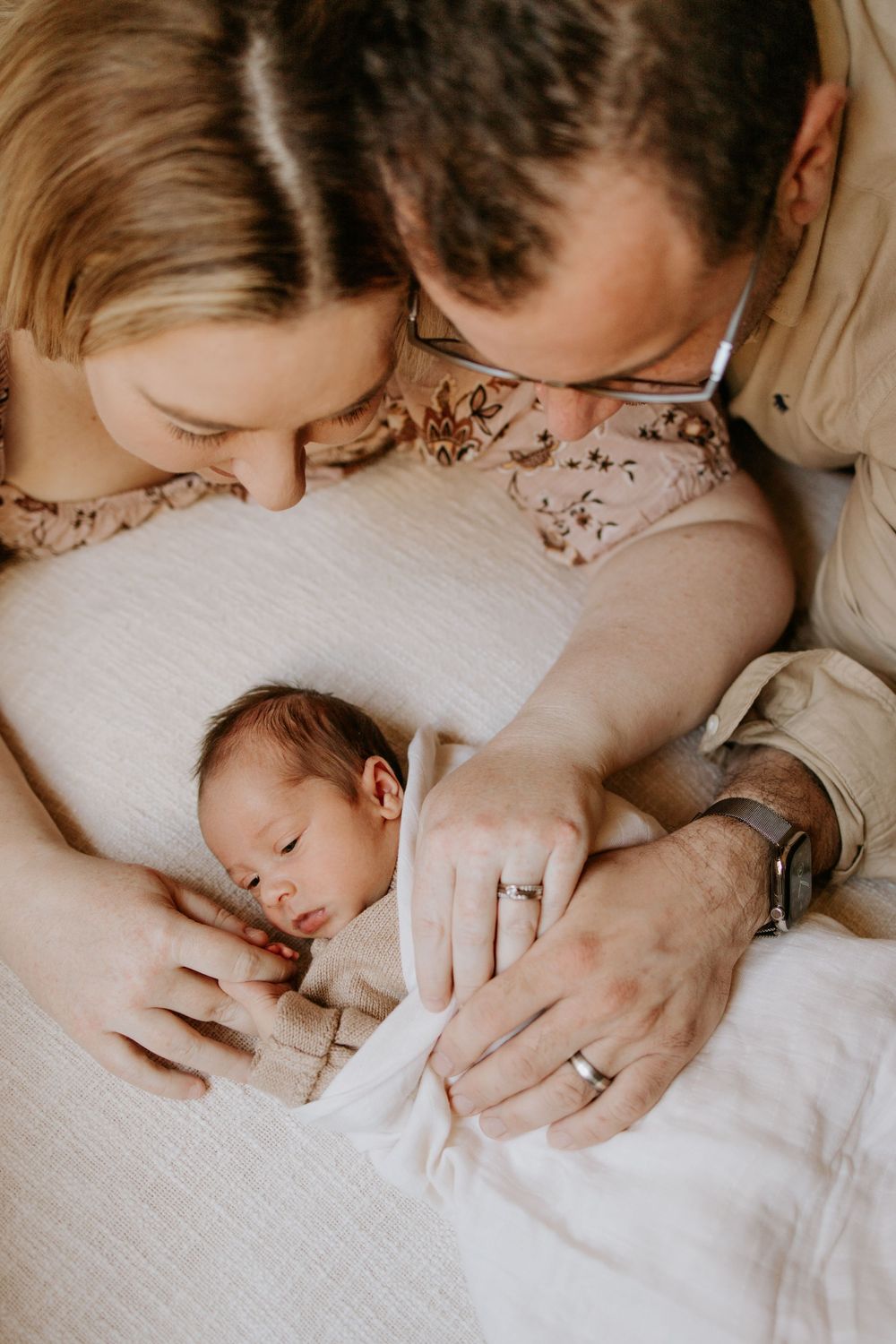 Adelaide newborn photographer - mother and father adoring newborn baby girl