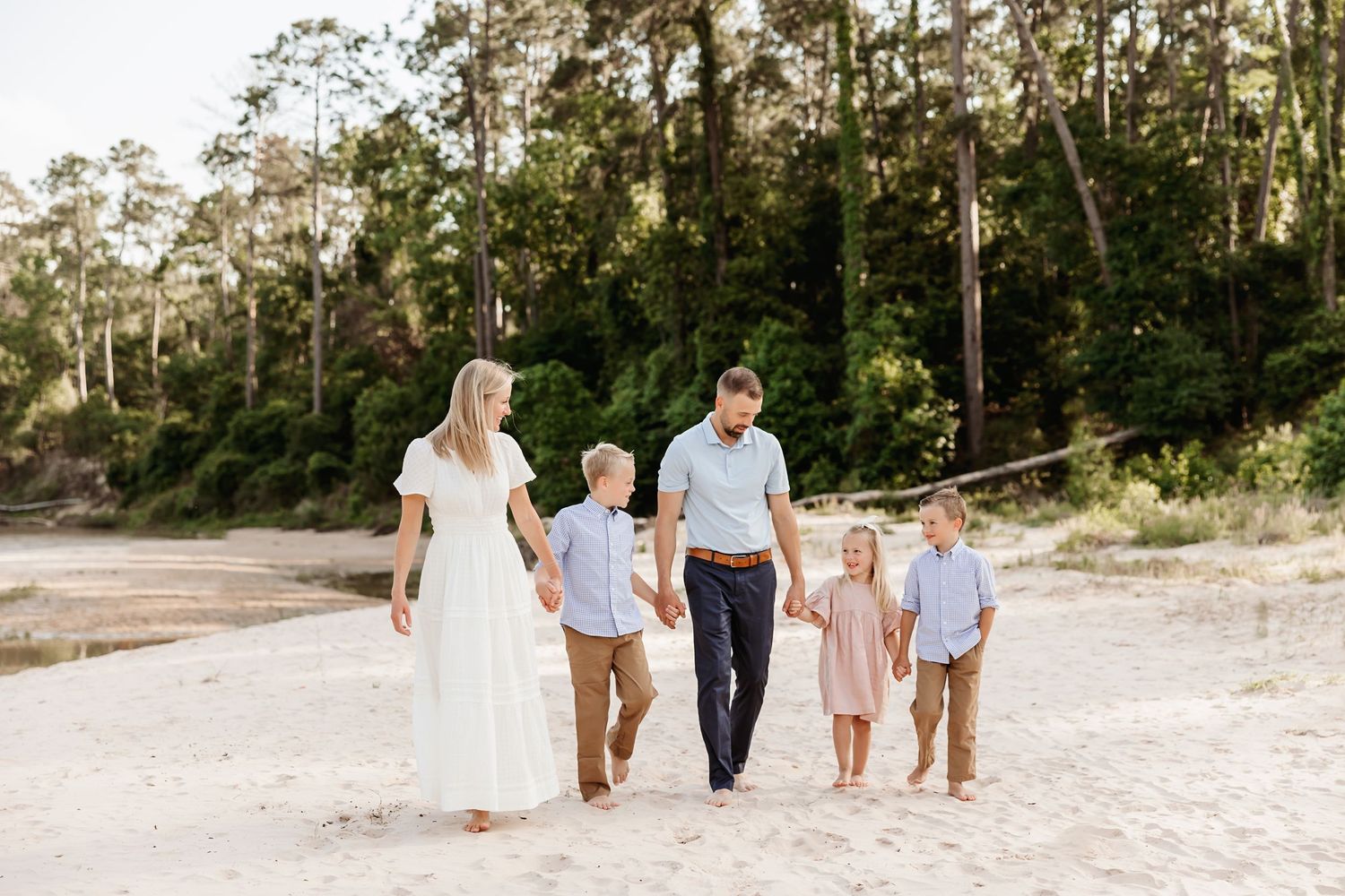 Family mini sessions in Magnolia TX featuring seasonal outdoor portraits and natural connection