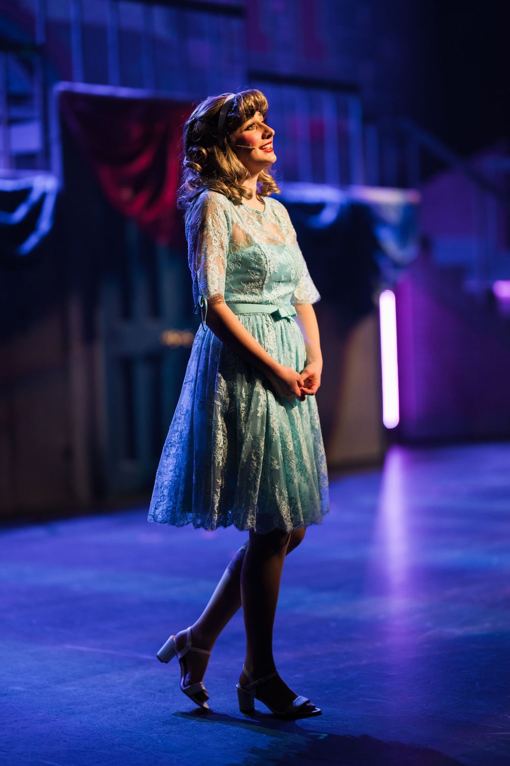 OLu performing arts students take the stage during a live production in the Nechita Center, captured by Chris Cornish Photography.