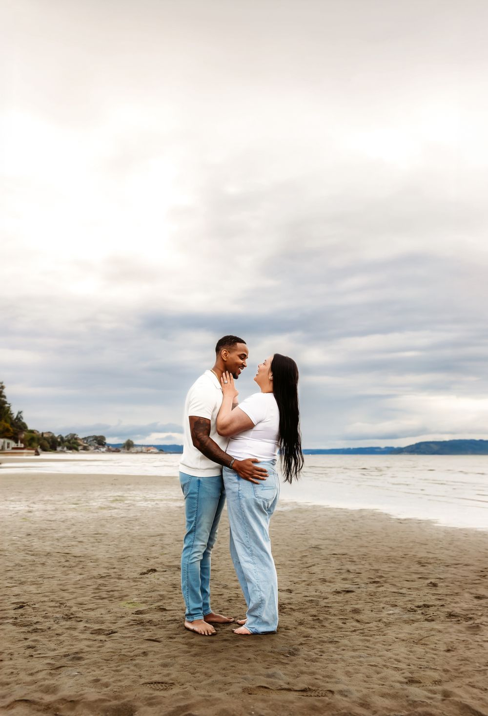 Couples session at a sandy beach in Dash Point State Park in Federal Way Washington
