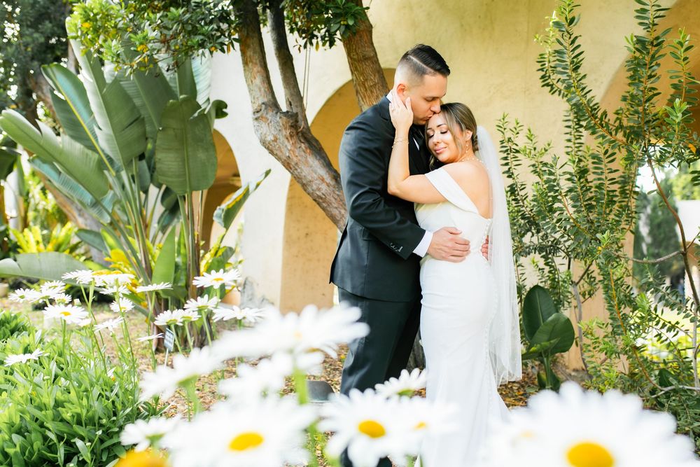 Bride and groom in flowers