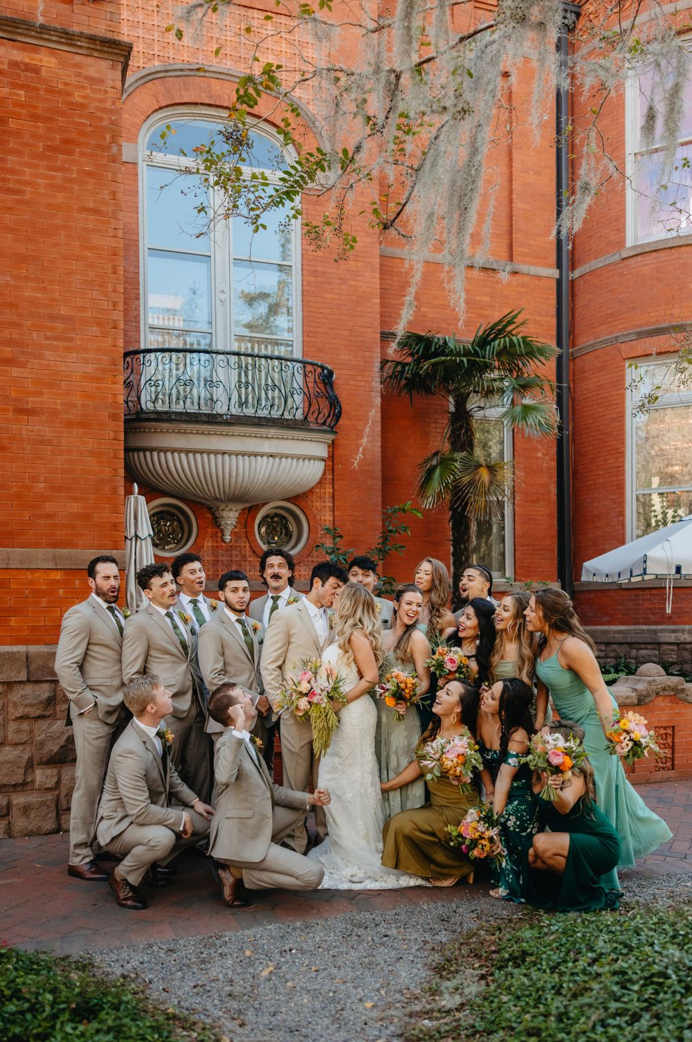 wedding party photo happiness and laughter at hotel bardo savannah ga destination photographer  destination international