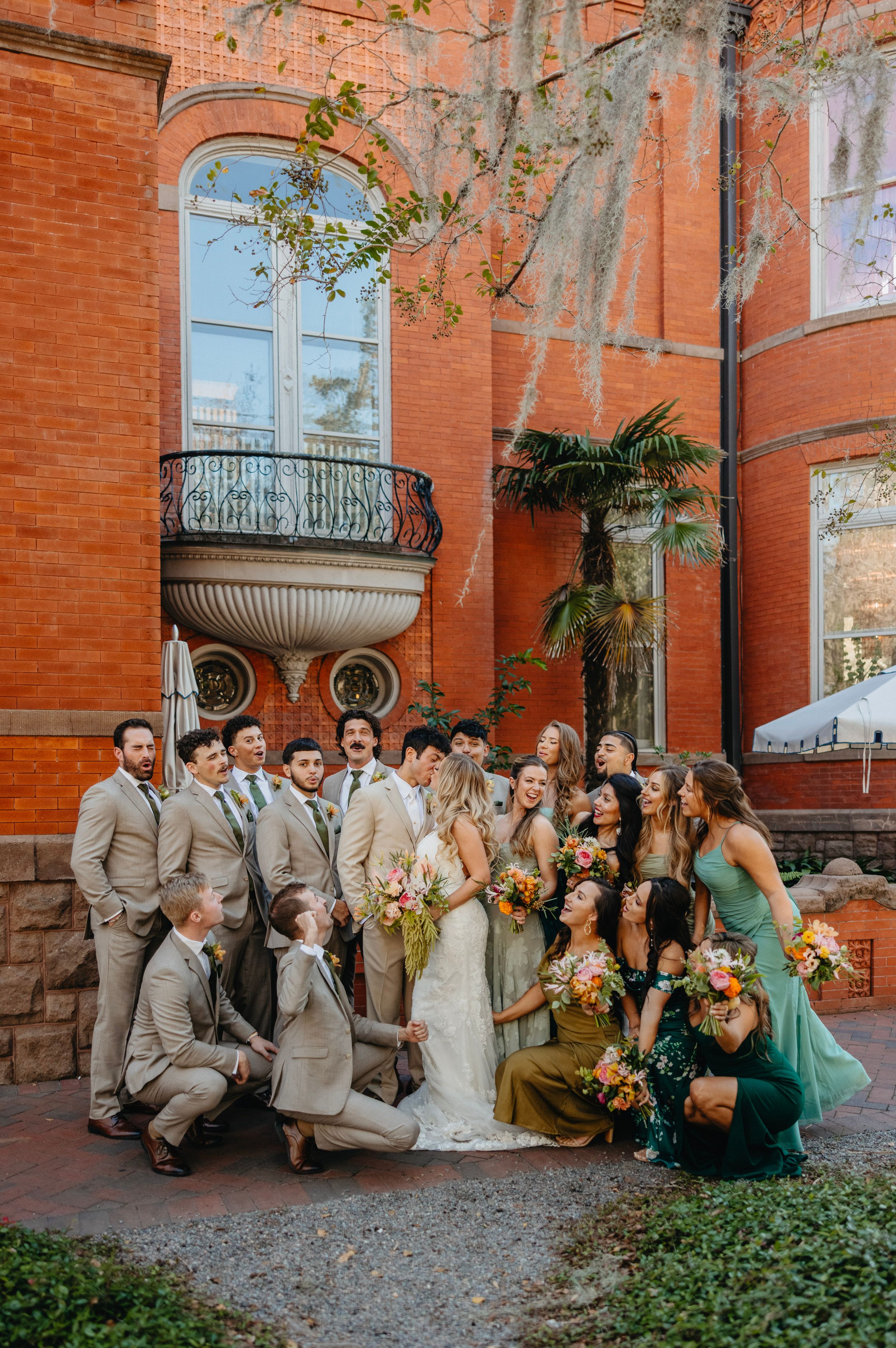 wedding party photo happiness and laughter at hotel bardo savannah ga destination photographer  destination international