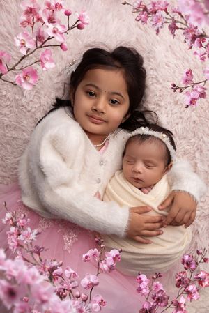 studio newborn photography with a sibling