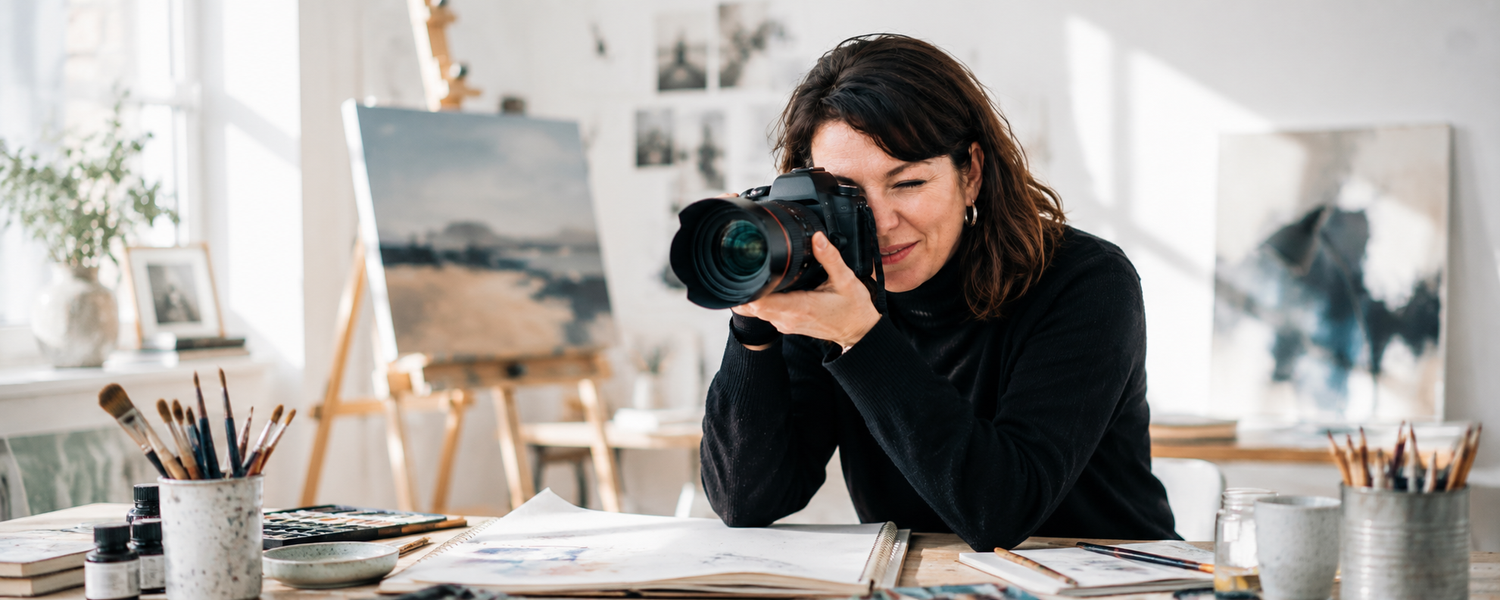 Portrait of photographer and Artist Nadine Ginzel while working