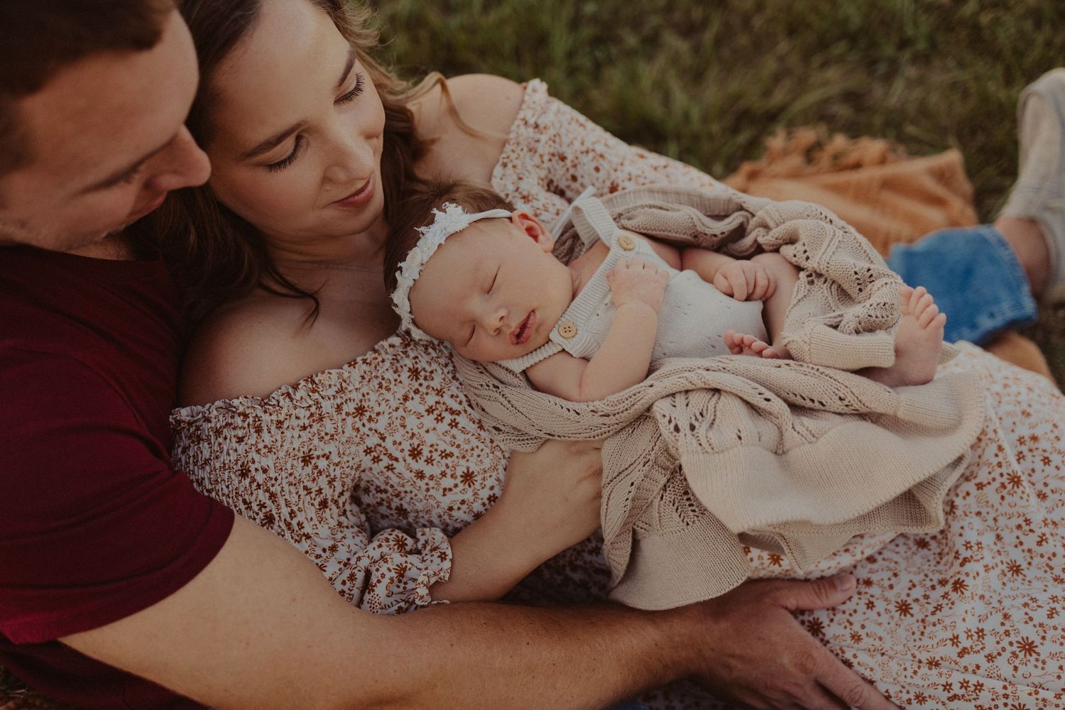 outdoor cozy newborn snuggles- newborn family photography