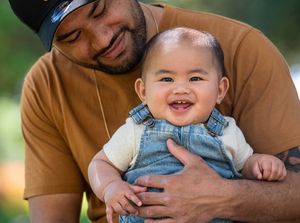 Young father with his infant son with bit cheesy grin - Kelly Chapman Photographer Perth