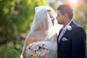 Newly married couple bridal portrait in setting sun - Kelly Chapman Photographer Perth
