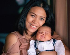 Portrait of a young Asian mum with her infant boy in lovely light - Kelly Chapman Photographer Perth