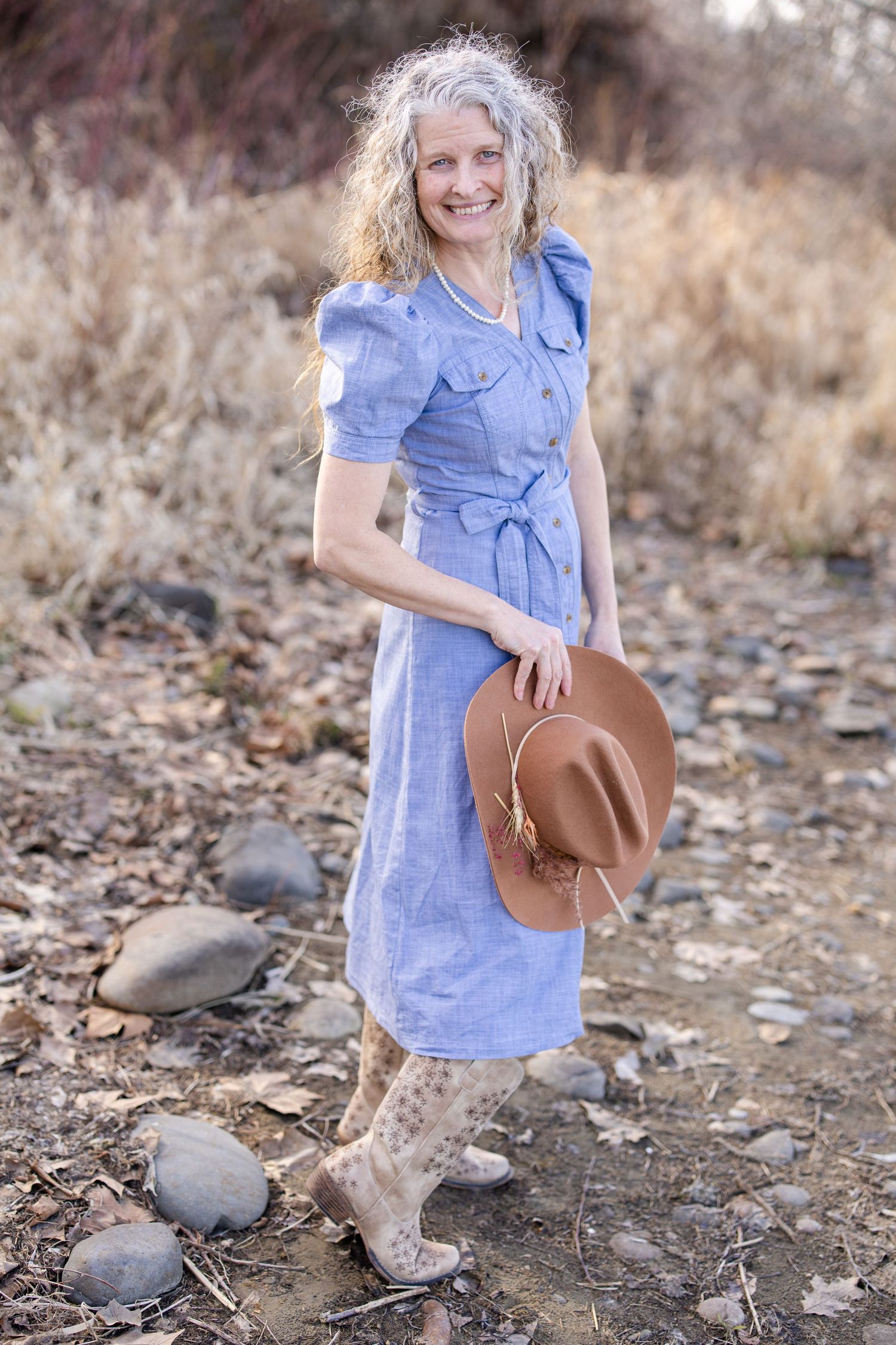 full length photo of woman in desert snow