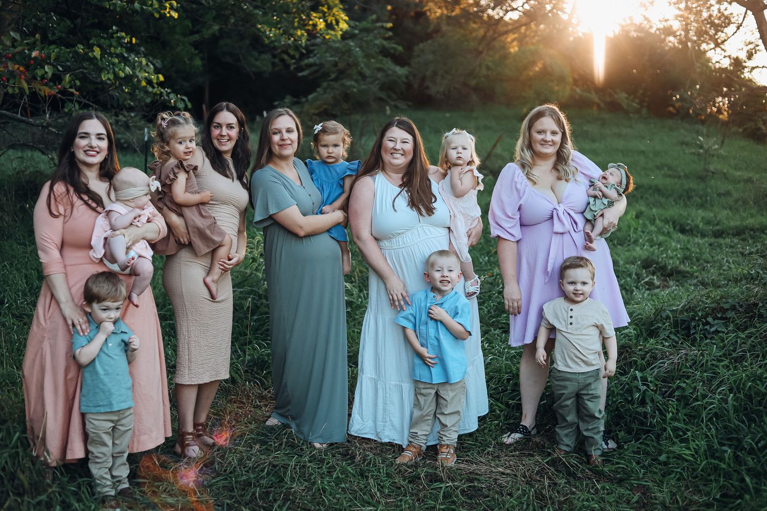 Group photo session in a lush garden setting during golden hour. Friend photography
