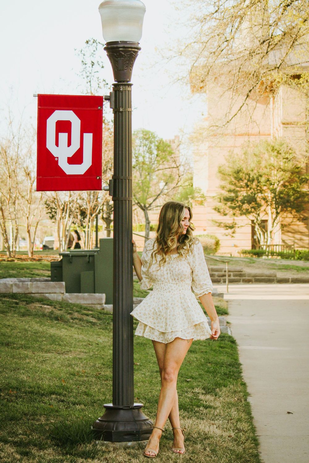 Golden hour senior portraits with timeless vibes in Norman Oklahoma at the University of Oklahoma