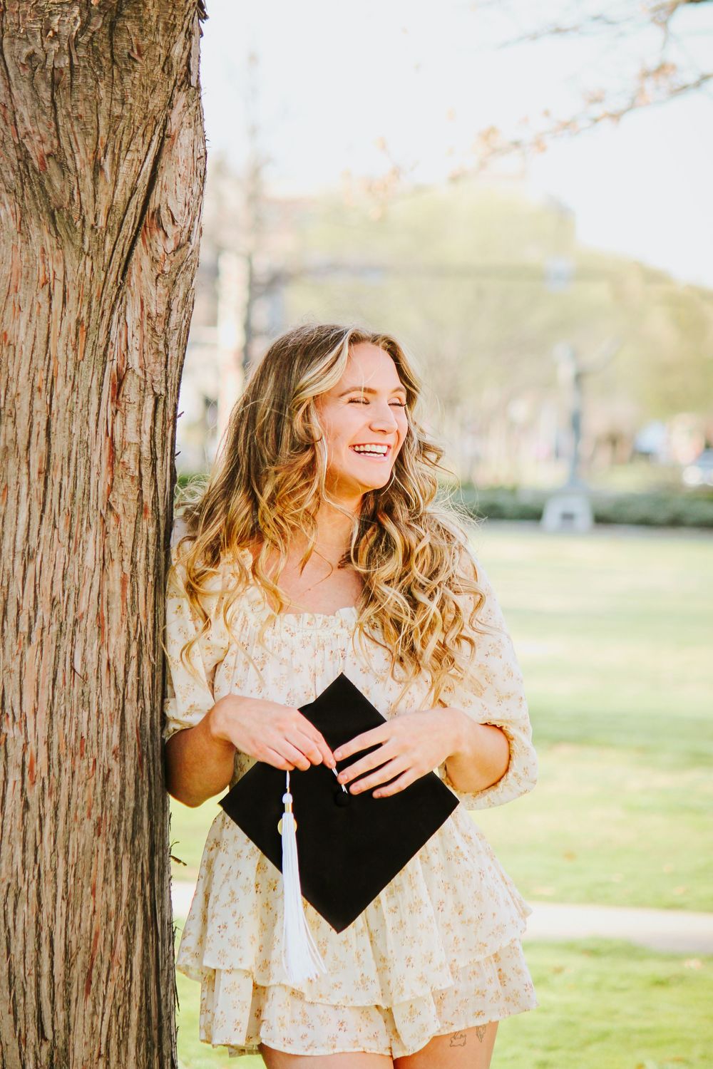 Golden hour senior portraits with timeless vibes in Norman Oklahoma at the University of Oklahoma