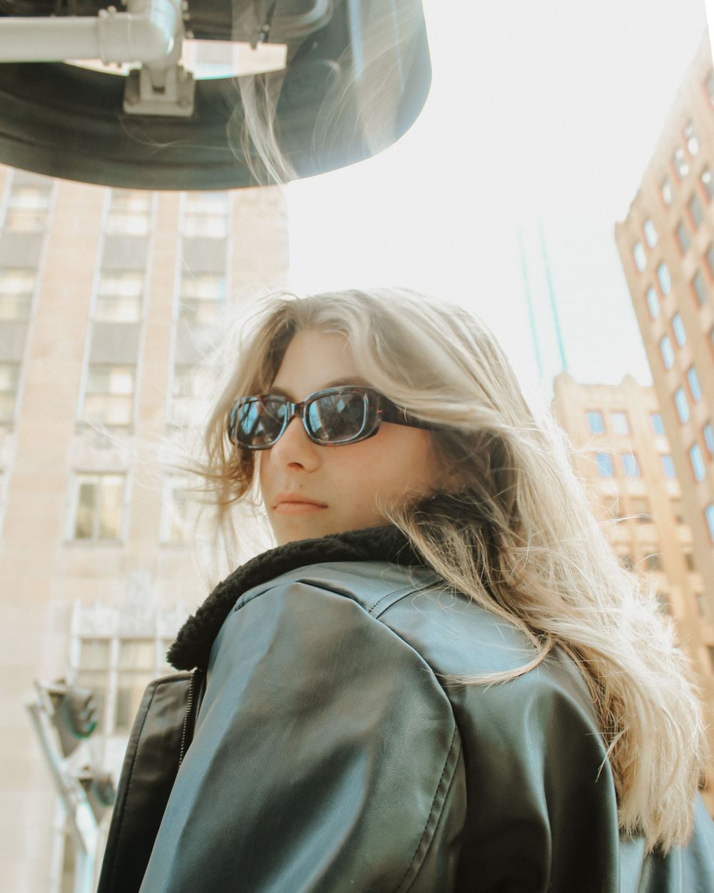 Golden hour senior portraits with timeless vibes in Downtown Oklahoma