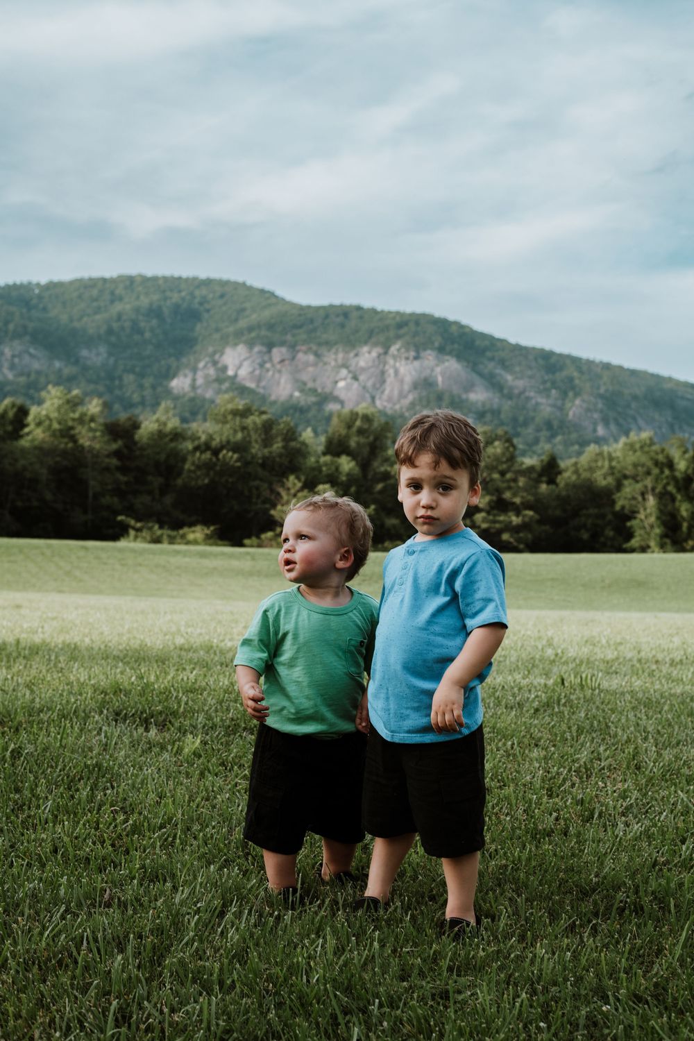 Family enjoying summer portrait session at Moses Cone Park, Lake Lure, NC.