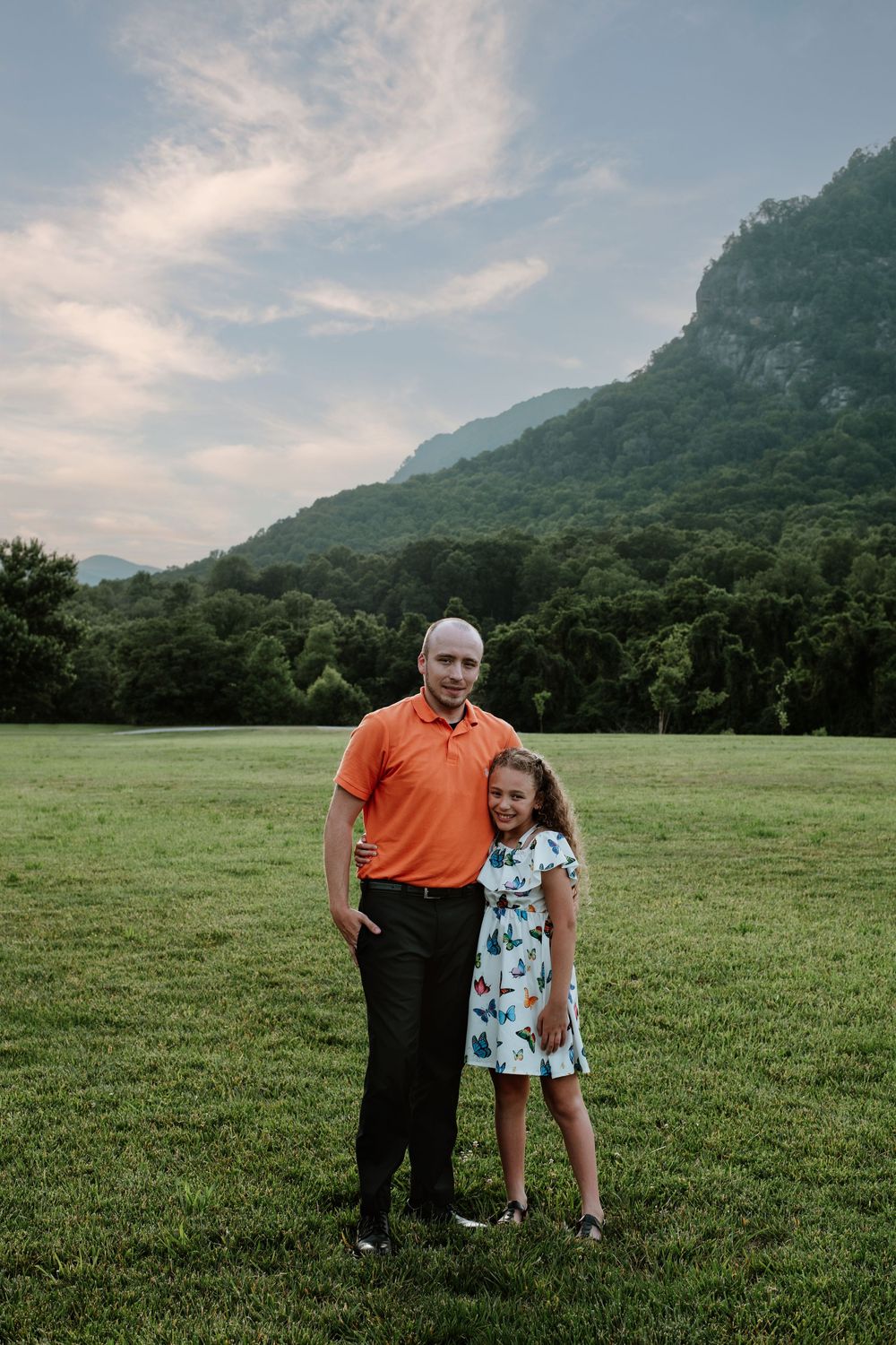 Family enjoying summer portrait session at Moses Cone Park, Lake Lure, NC.