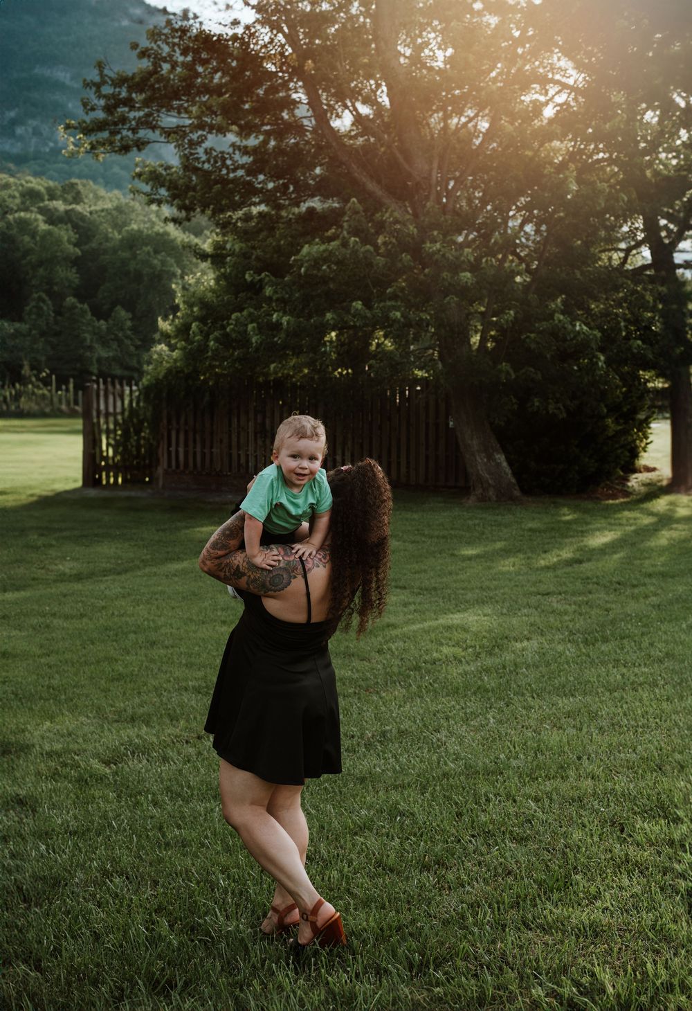 Family enjoying summer portrait session at Moses Cone Park, Lake Lure, NC.