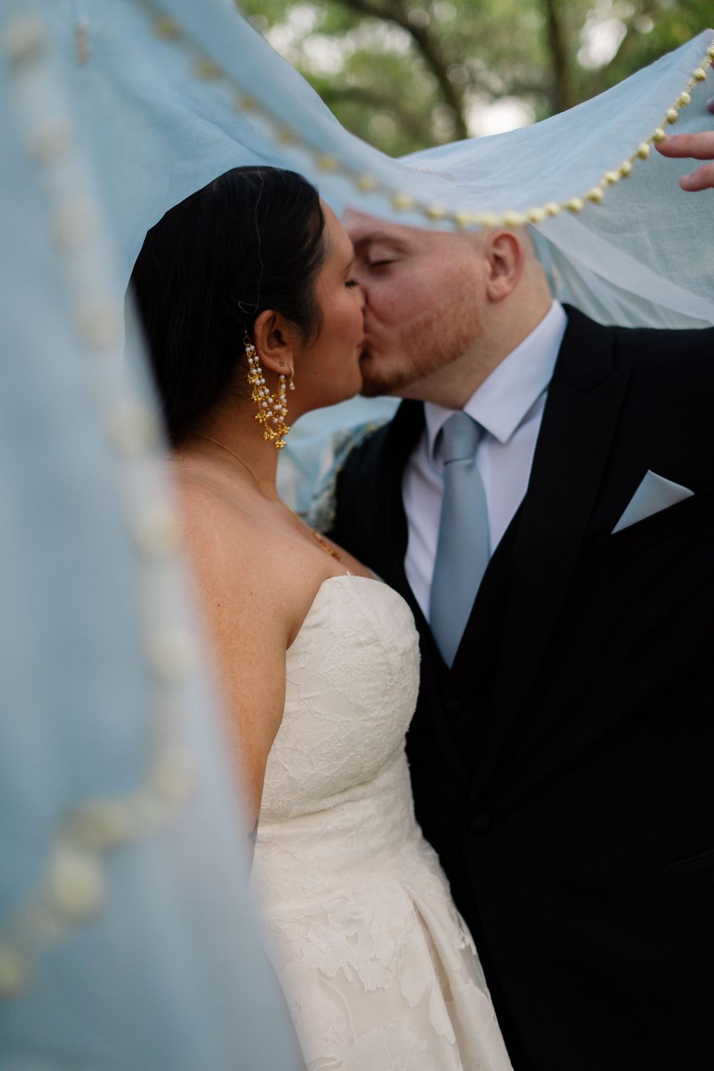 Romantic wedding moment captured in a series of intimate photos.