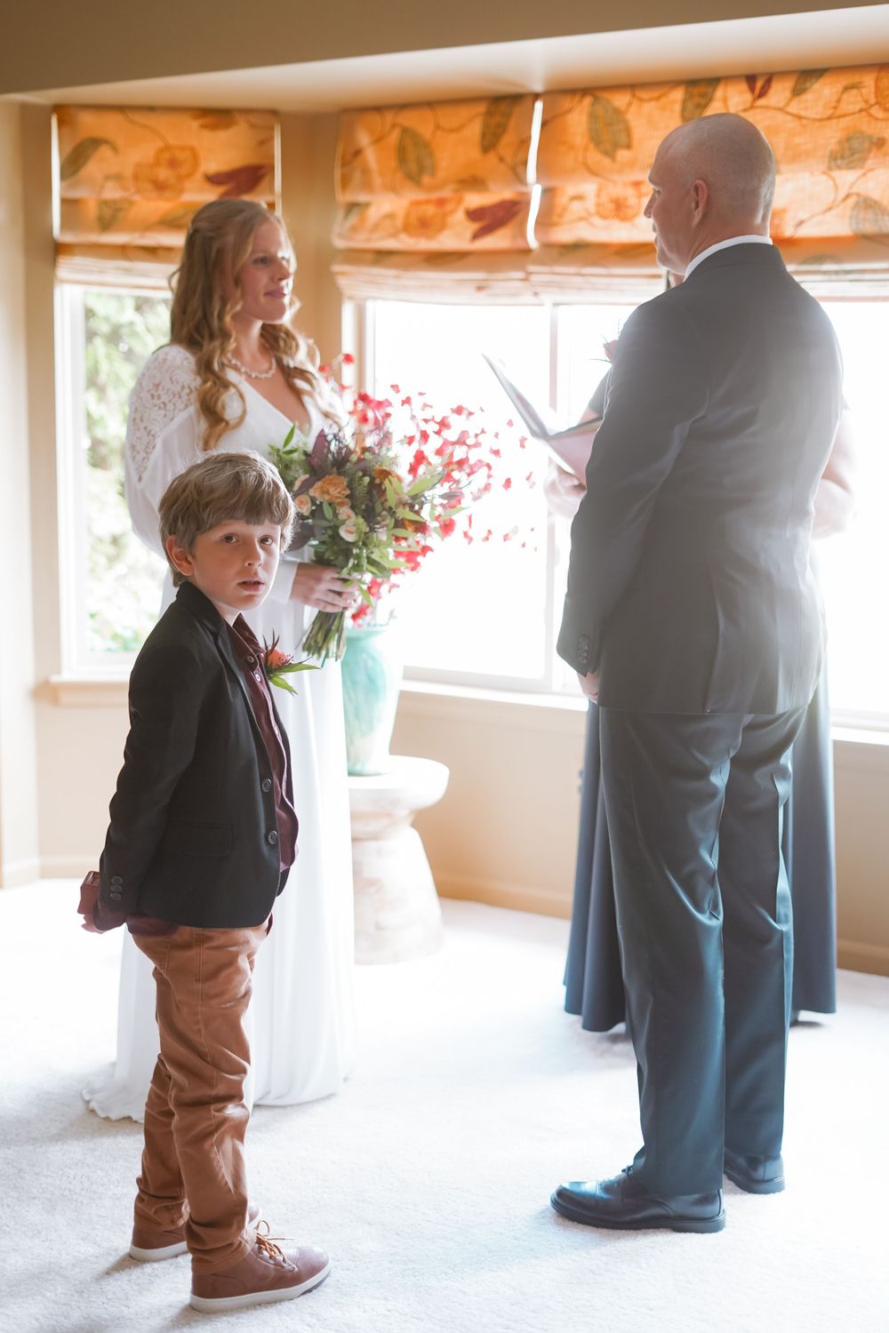 Series of candid wedding reception photos showing guests' legs and feet during a celebration.