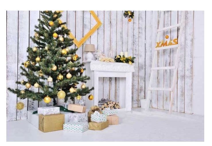 Christmas tree with gold ornaments beside white fireplace, gifts, and XMAS sign on rustic wood wall backdrop.