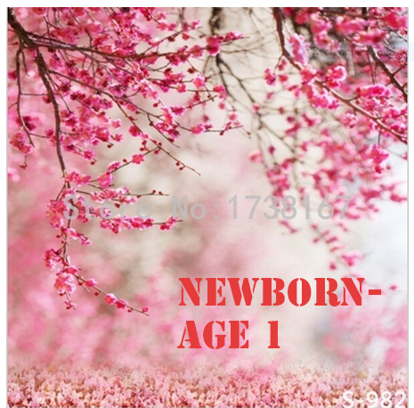 Pink cherry blossom photography backdrop for newborn to age 1 photo sessions with soft floral background.