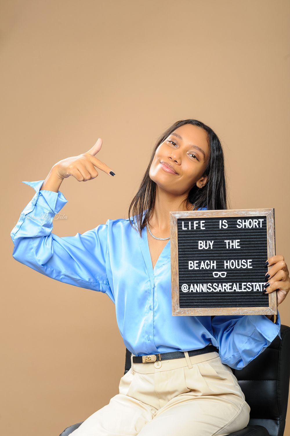 Creative portraits with letterboard showing fun expressions and casual business attire.