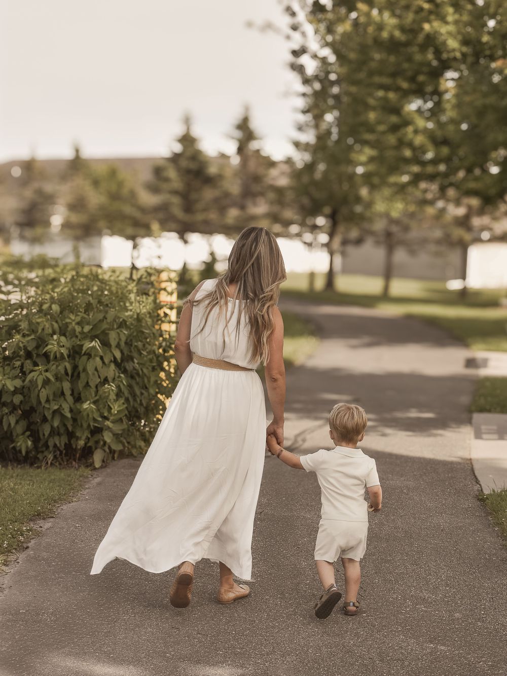 Holding his small hand, remembering him this way.  Lifestyle family photography sharing memories.